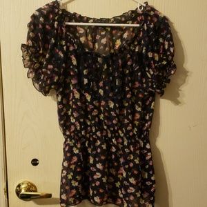 Floral and ruffle navy blouse.